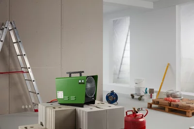 Green Remko gas heater on construction site