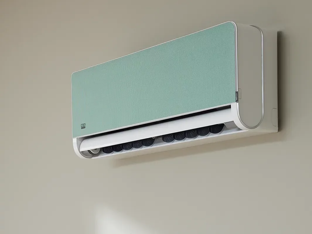 Klimawandgerät ATY DC Deko Klimawandgerät mit mintgrüner Blende an Wand